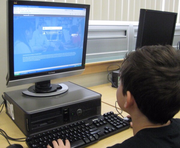 a student working at a computer